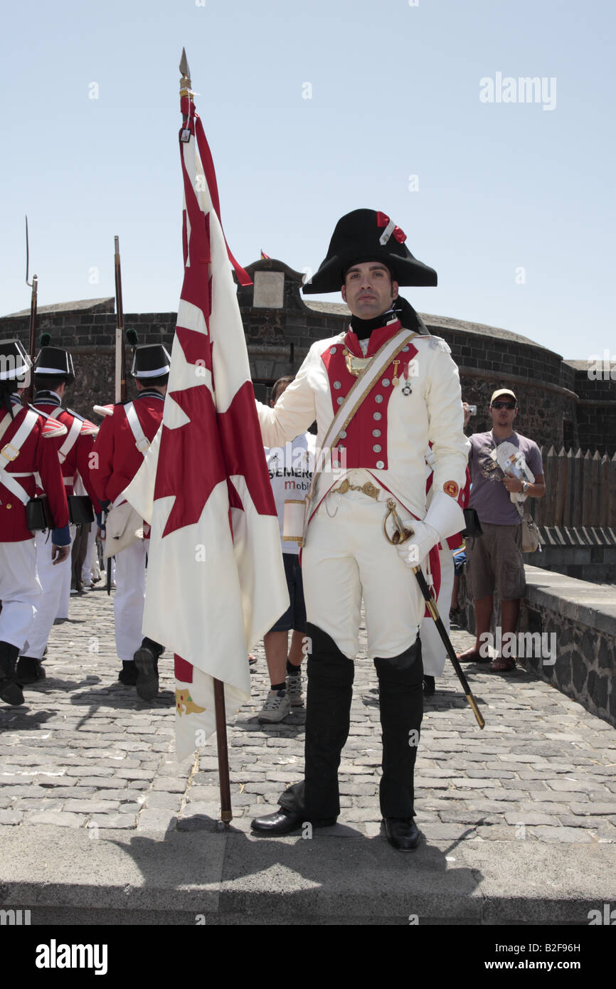 The Flag Bearer of the Batallon de Canarias in front of the Castillo Negro after a reenactment of the 1797 battle of Santa Cruz, Tenerife Stock Photo