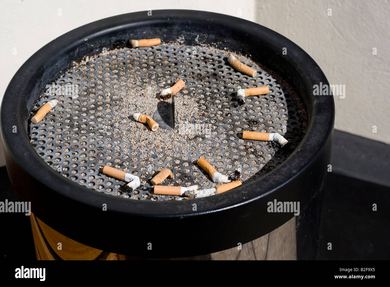 Closeup of cigarette buds in trash can Stock Photo Alamy
