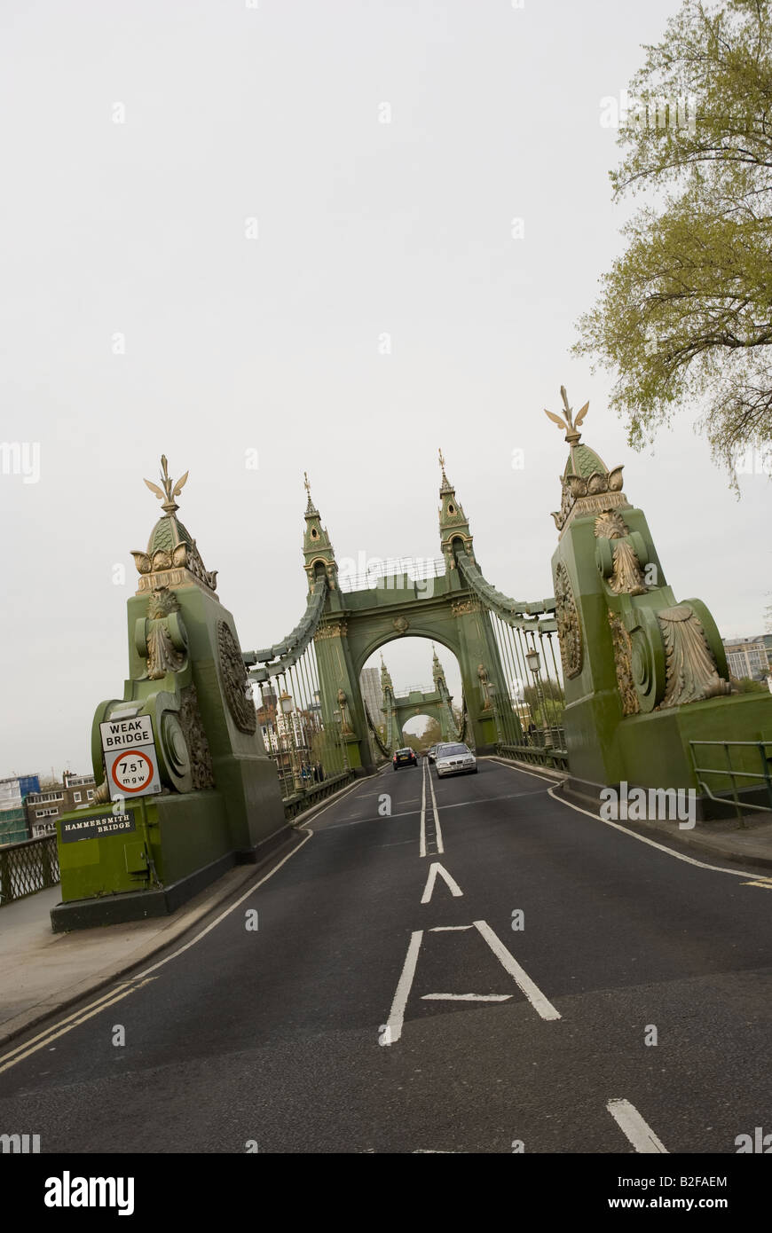 The approach to Hammersmith Bridge in London. Stock Photo