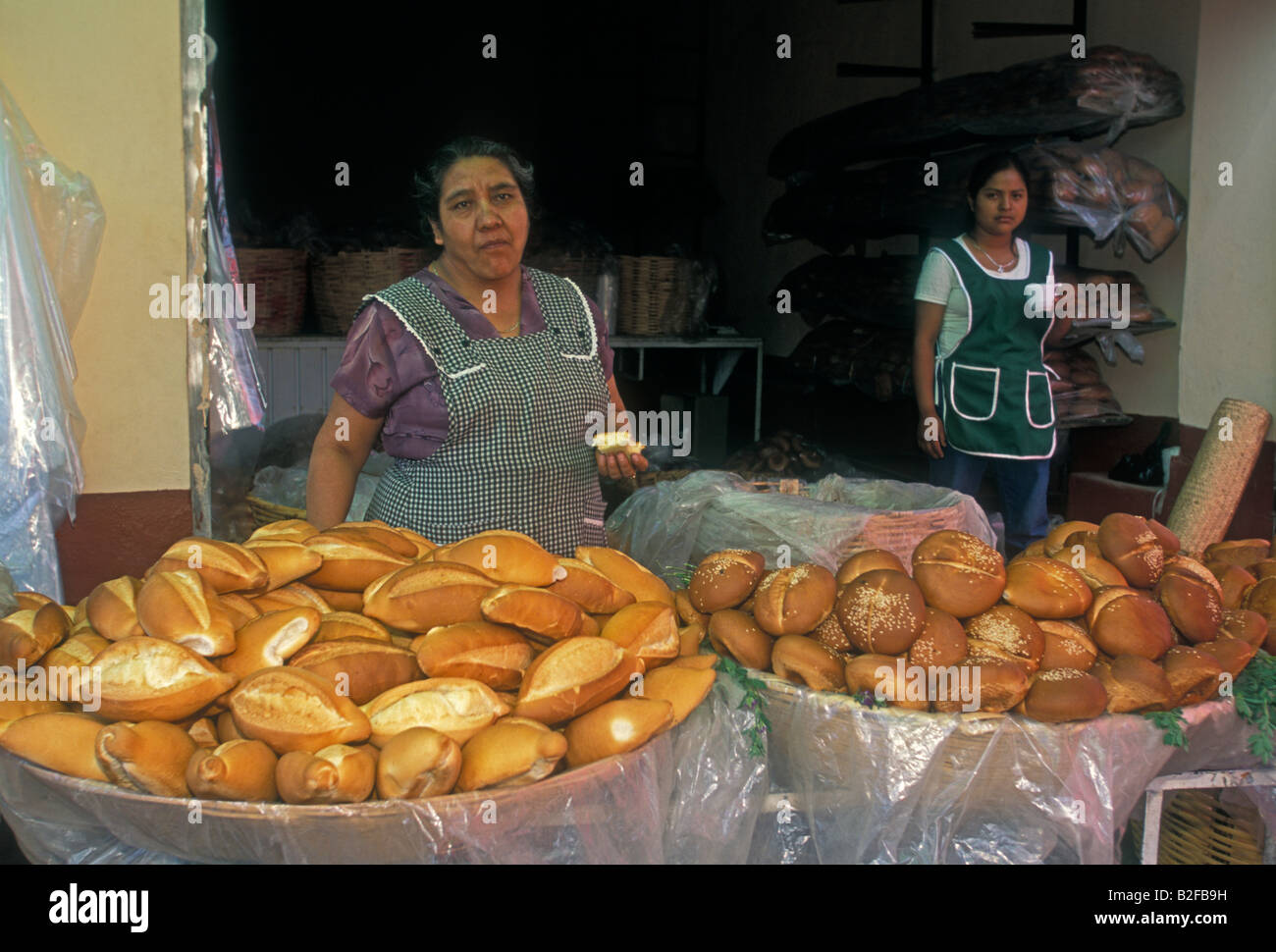 Mexican woman, bread vendor, vendor selling fresh bread homemade bread