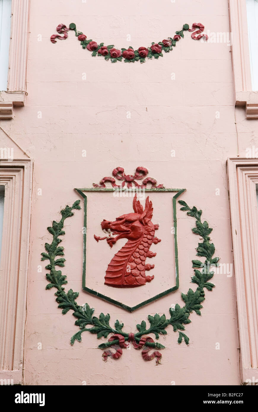 Welsh Dragon symbol, Wales, found on the wall of a building in Barmouth, Gwynedd 2008 UK  2000s HOMER SYKES Stock Photo