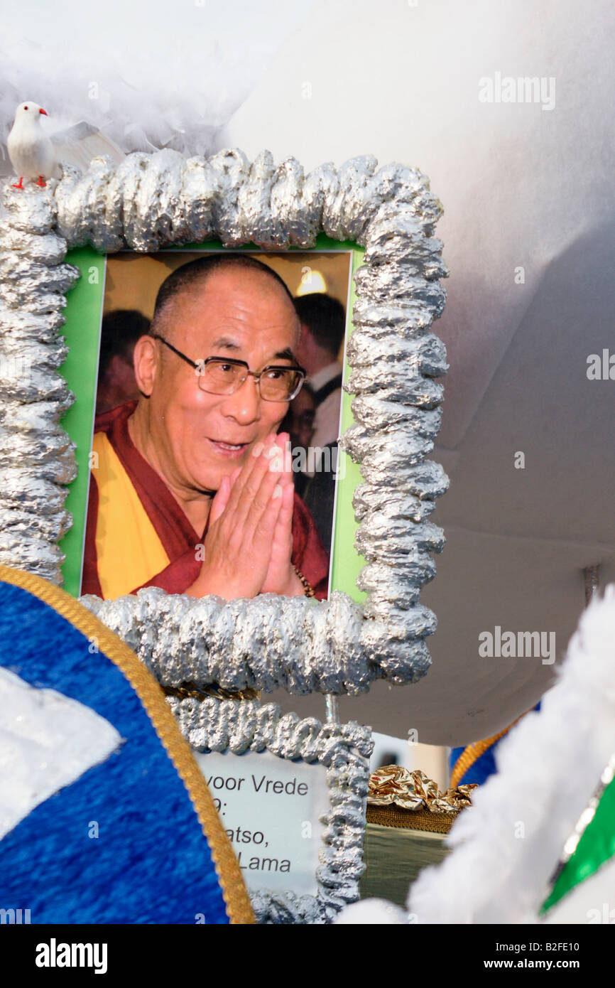 Image of His Holiness Dalai Lama Tenzin Gyatso on chariot at Rotterdam Summer Carnival dance parade, Netherlands 2008 Stock Photo