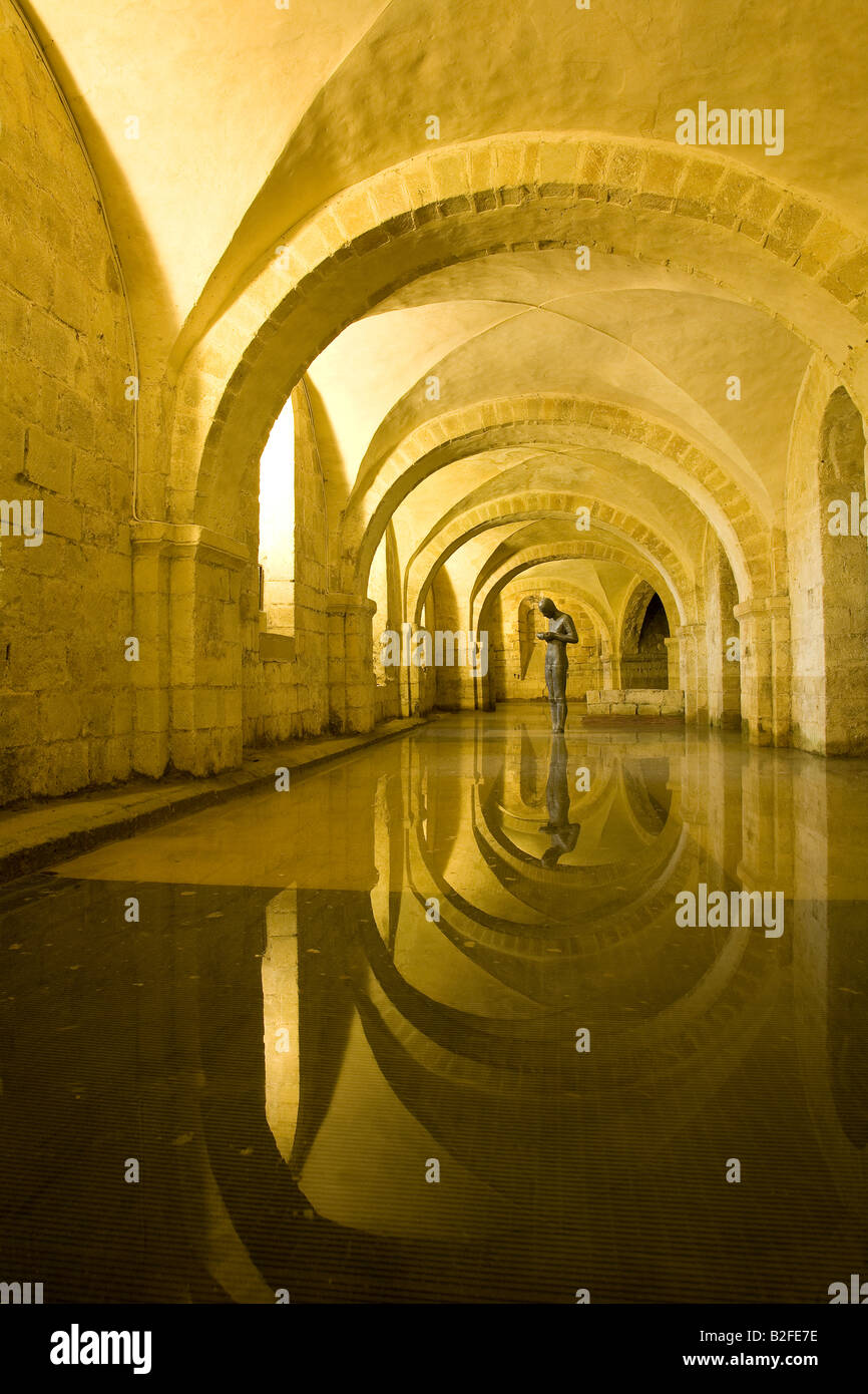 Sound II 2 statue sculpture by Antony Gormley in flooded crypt of Winchester Cathedral Hampshire England United Kingdom GB Stock Photo