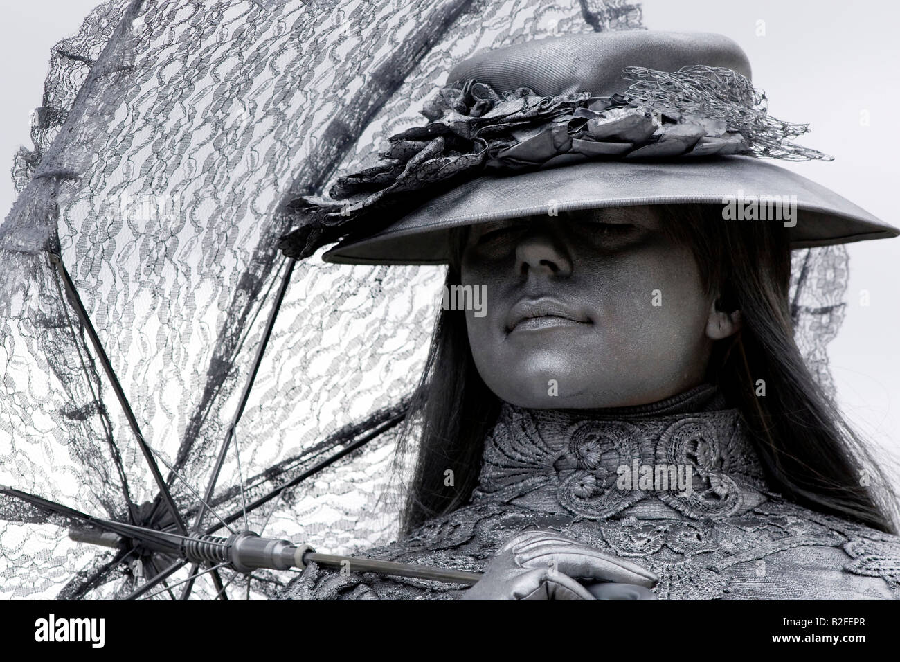 Silver painted street performer hires stock photography and images Alamy
