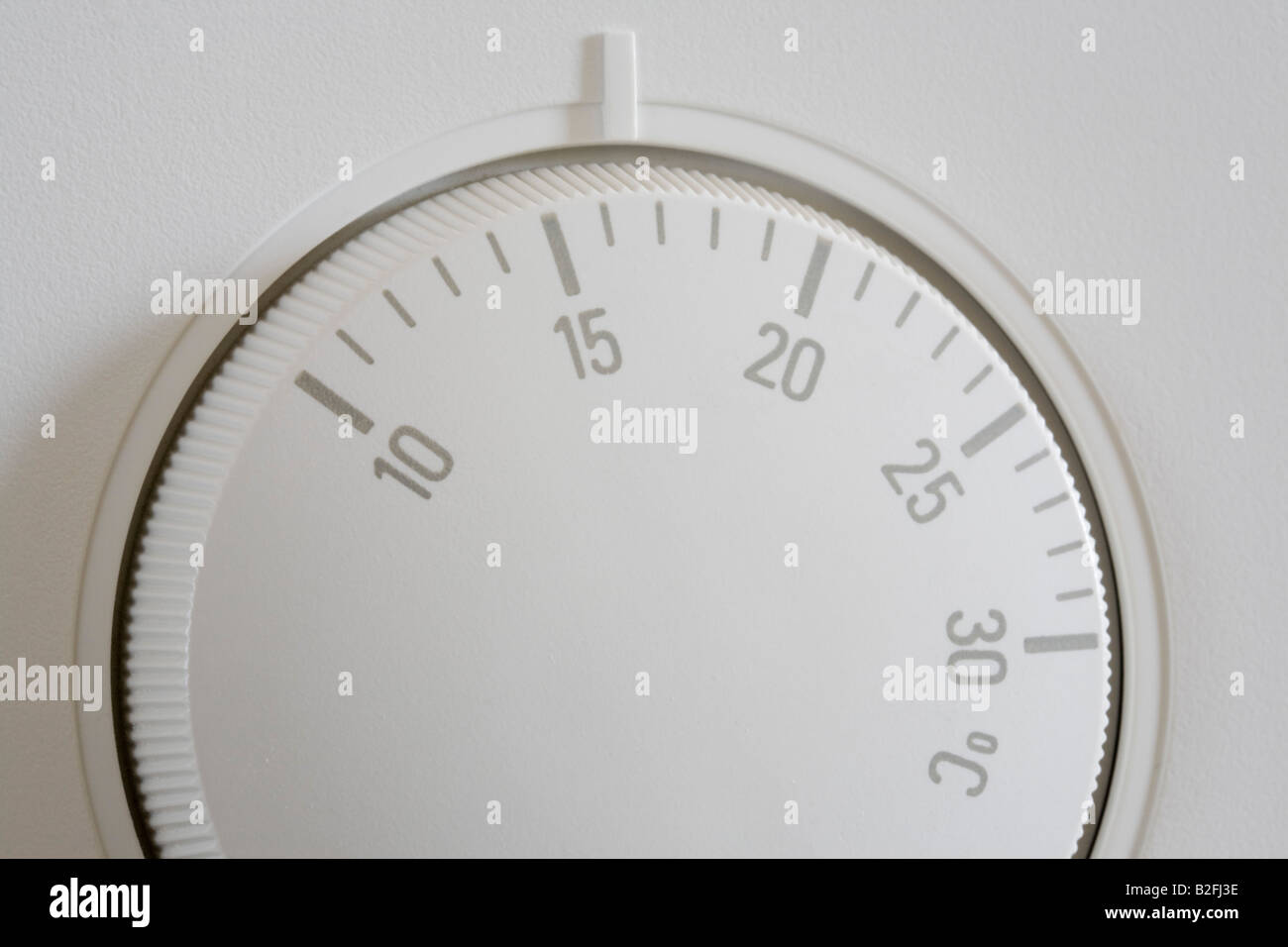 Britain UK Central heating thermostat set at a low temperature 16