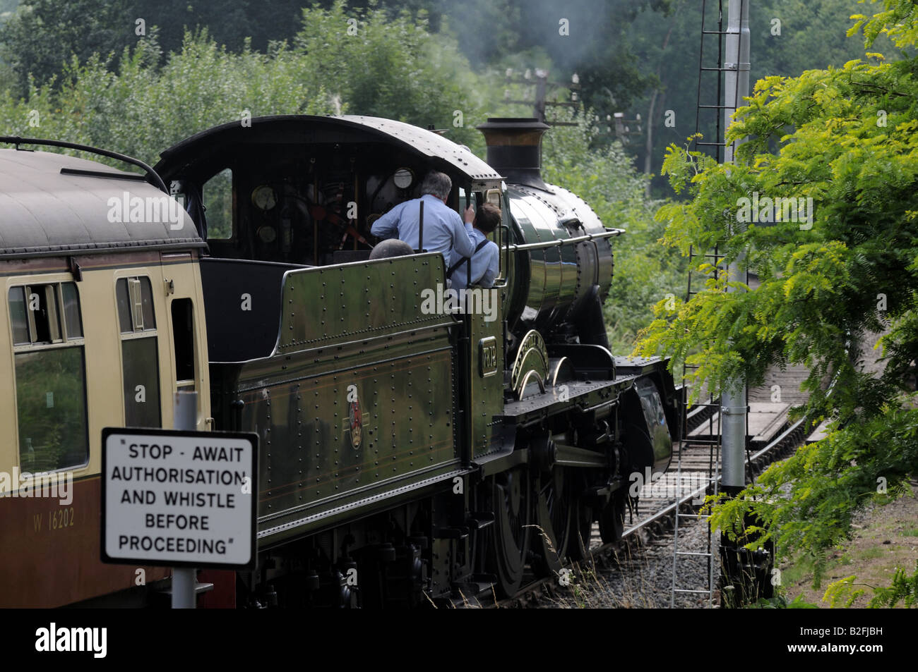Steam train leaving Highley station on the Severn Valley Railway Shropshire Stock Photo