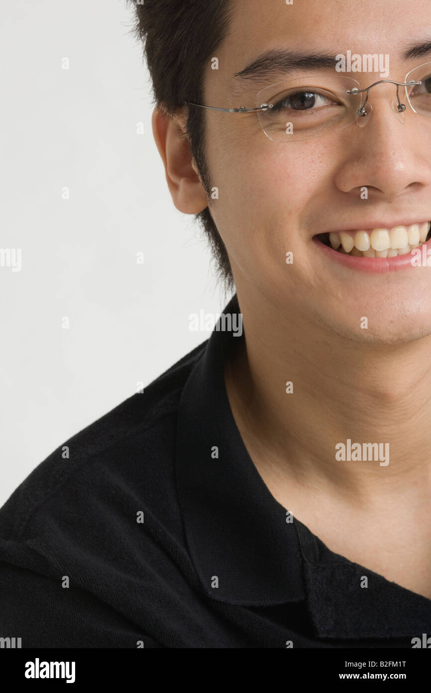 Portrait of a young man smiling Stock Photo - Alamy