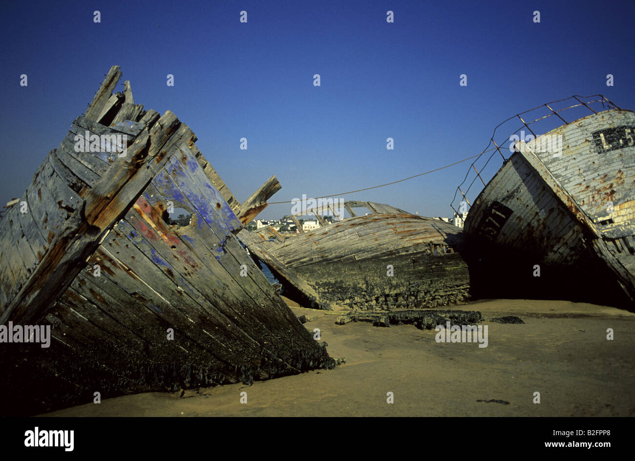 Breakdown shipwreck at the beach Stock Photo