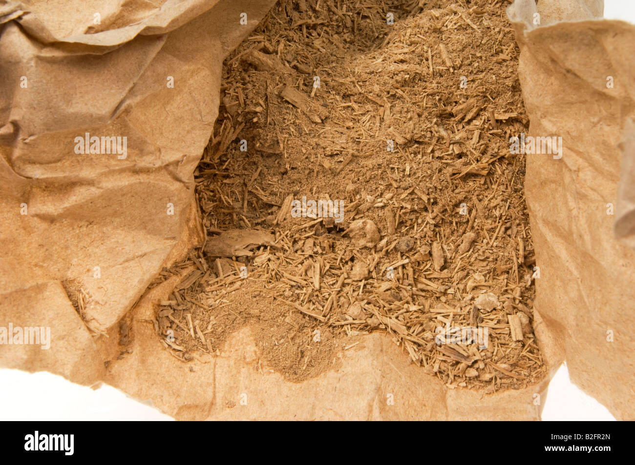 Kava from the southsea KAVA POWDER Kawa Piper methysticum Rauschpfeffer Medicinal plant dried root hachkled root Stock Photo