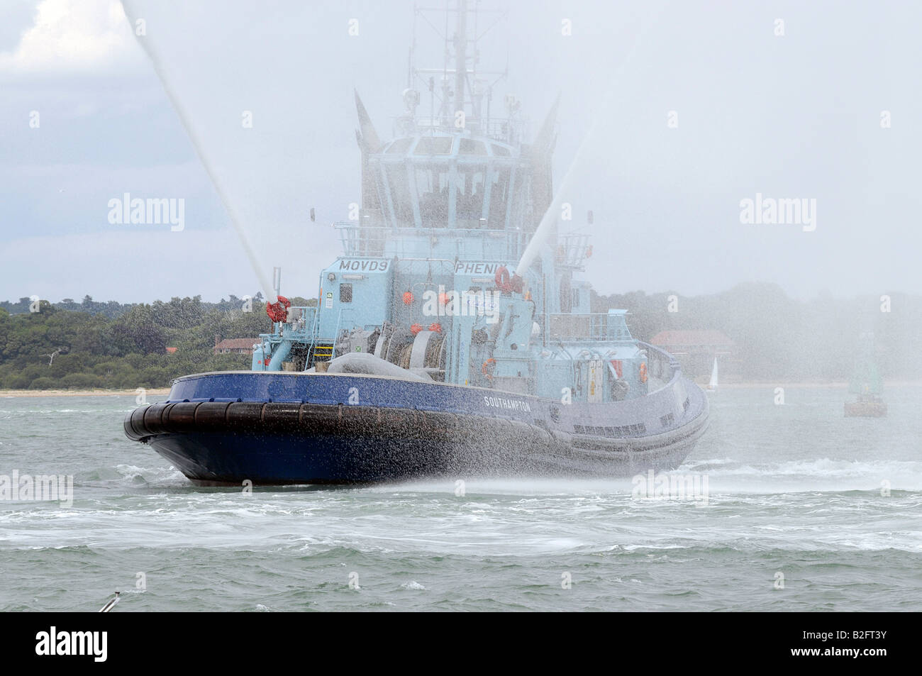 tug boat with fire fighting capabilities designed for towing tankships oil Tankers Stock Photo