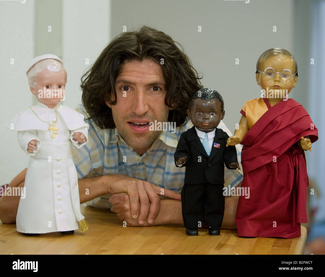 The dolls doctor Marcel Offermann with his dolls the Pope Benedict the Dalai Lama and Barack Obama Stock Photo