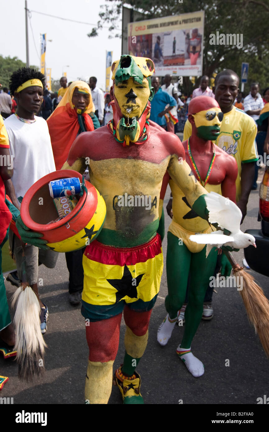 Men painted with colours of Ghana in Accra for Africa Cup of Nations football tournament Stock Photo