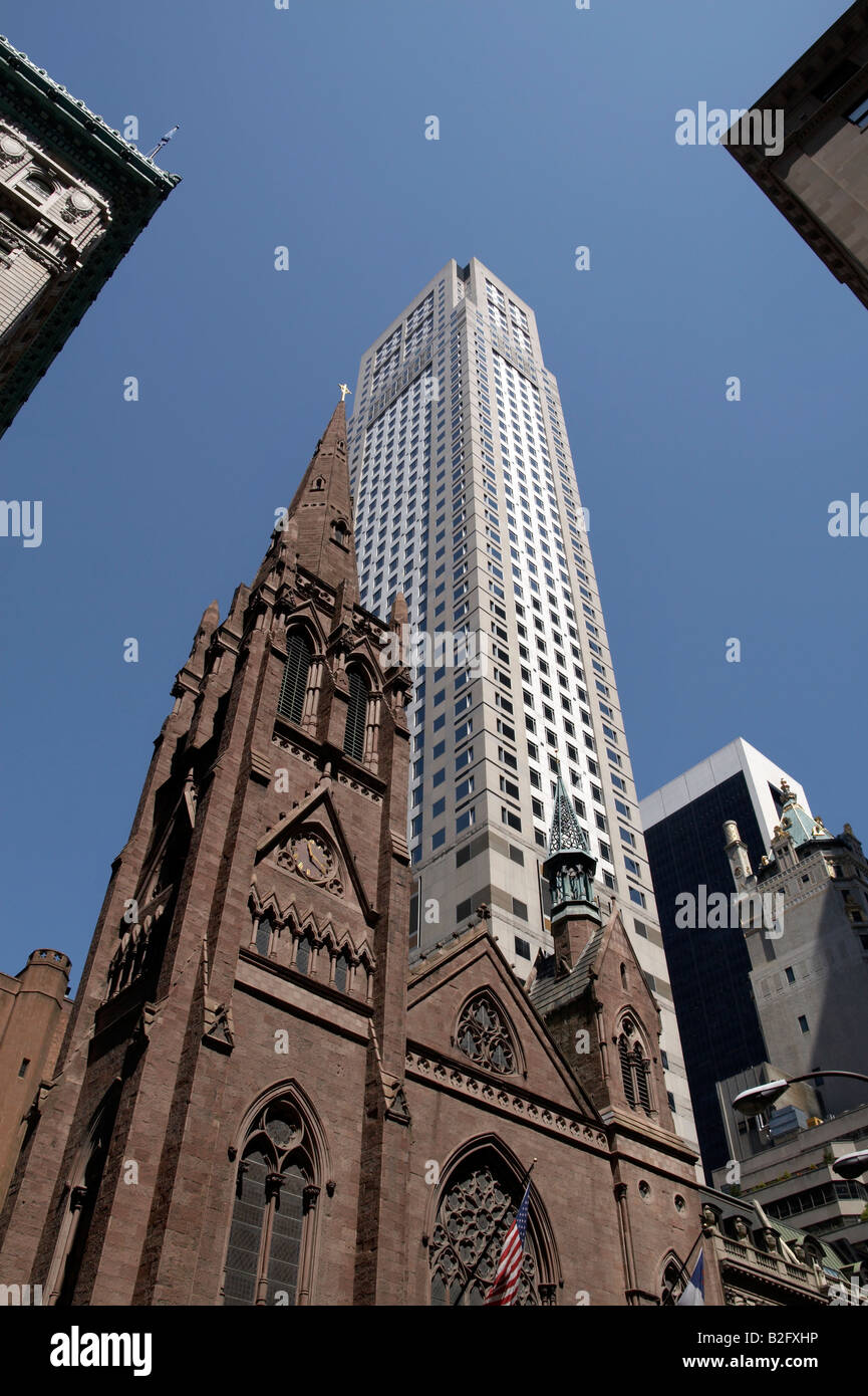 5th avenue presbyterian church in the foreground and 712 5th Avenue in the background, Manhattan, New York City Stock Photo