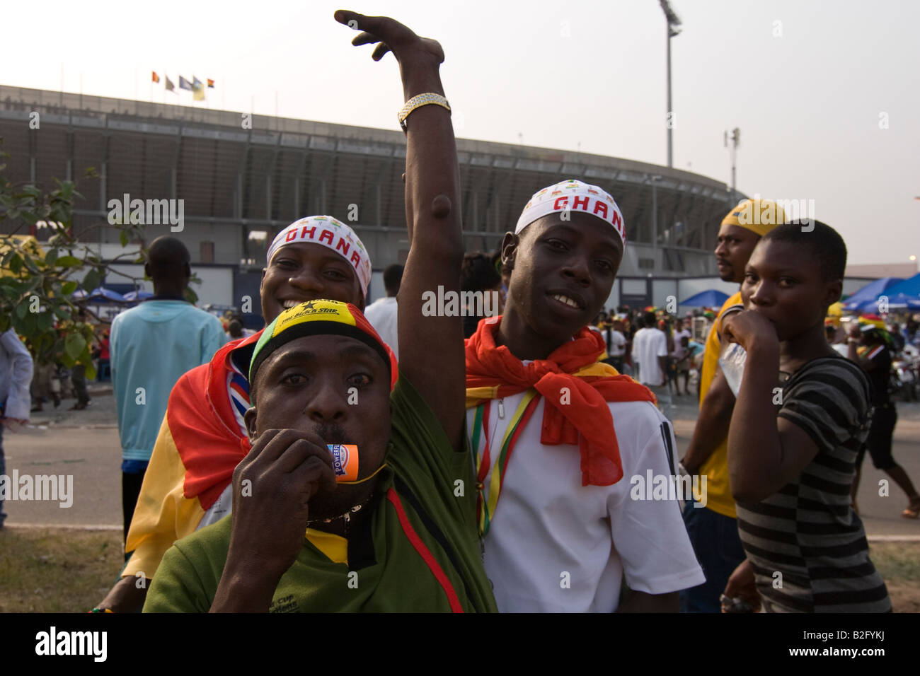Football supporters outside Ohene Djan football stadium on opening day Africa Cup of Nations Ghana 2008 Stock Photo