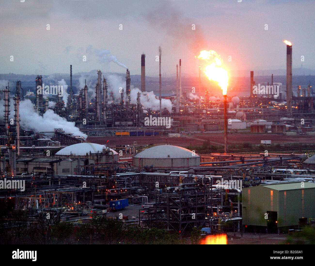 Flare stack burning waste gas at Grangemouth Oil Refinery