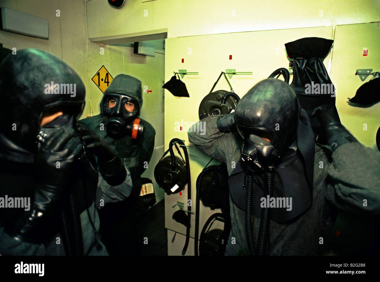 NEXT BATTLE OF BRITAIN PHANTOM CREW GETTING INTO CHEMICAL GERM WARFARE SUITS 1988 Stock Photo