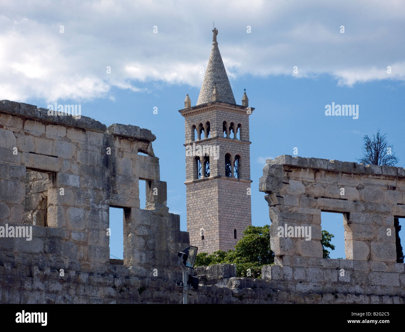Stone church and part of Arena Pula, Istria, Croatia Stock Photo