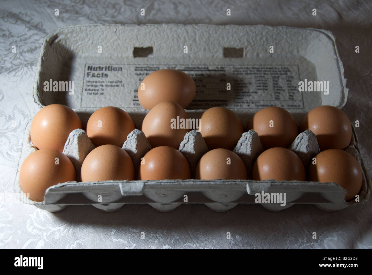Baker's dozen organic brown eggs Stock Photo Alamy