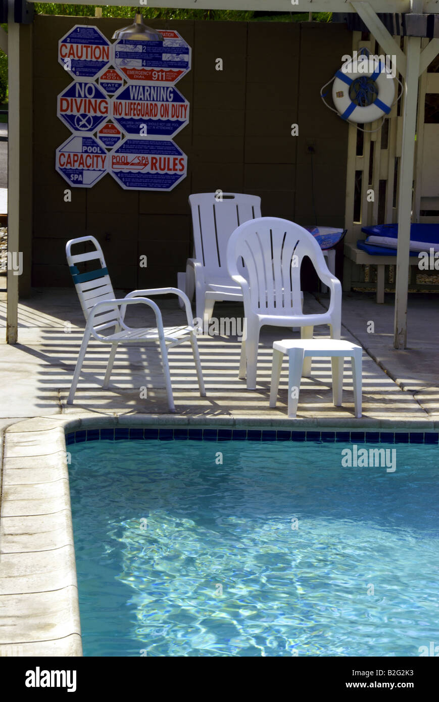 Plastic chairs at swimming pool Stock Photo Alamy