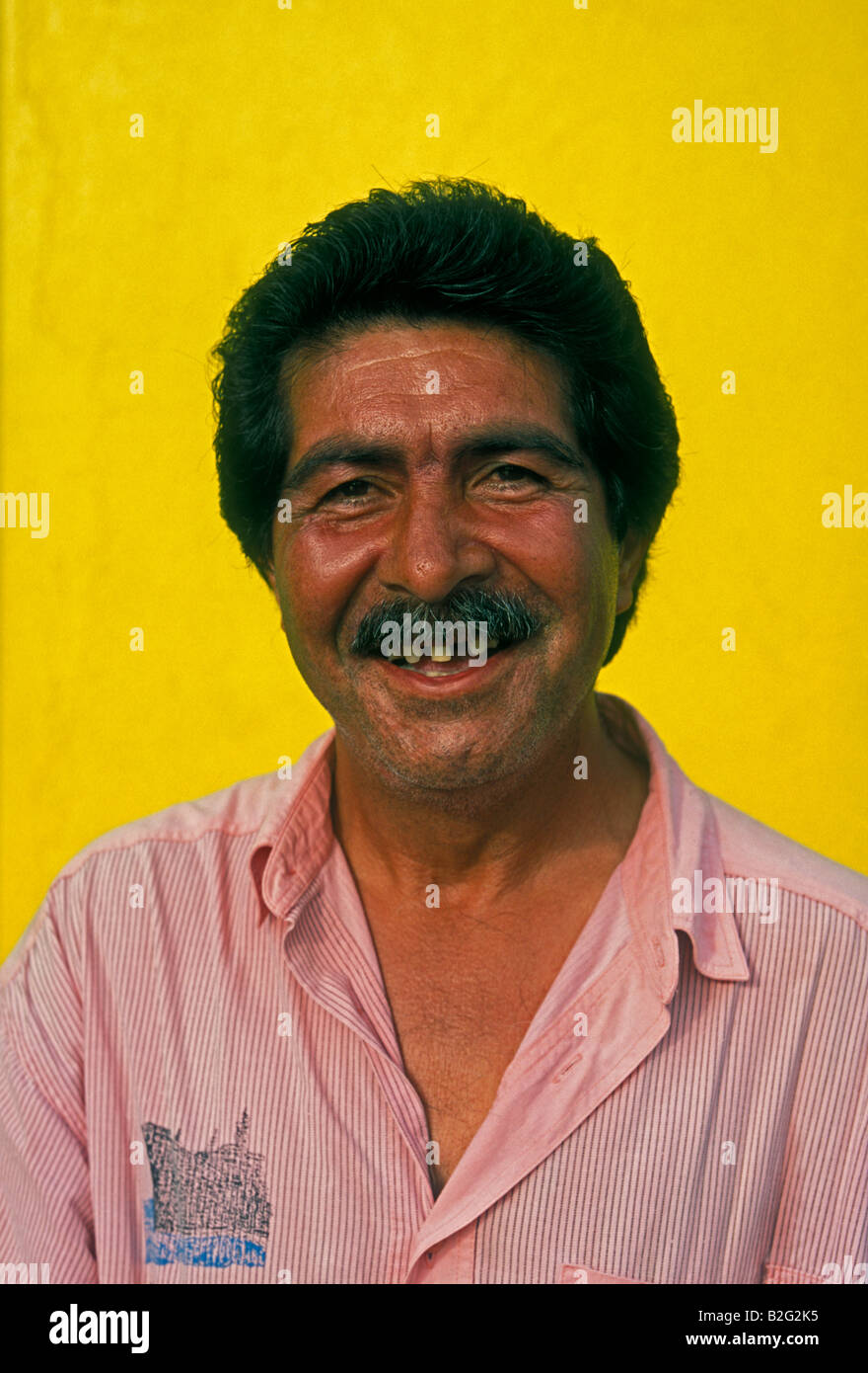 1, one, Puerto Rican man, Puerto Rican, man, adult man, eye contact, front view, portrait, town