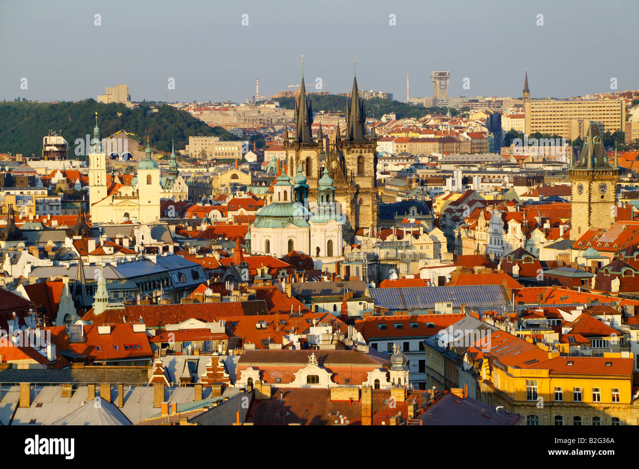 The aerial view of the spires of the St Nicolas Cathedral and the Church of Our Lady before Tyn in the Old Town in Prague Stock Photo