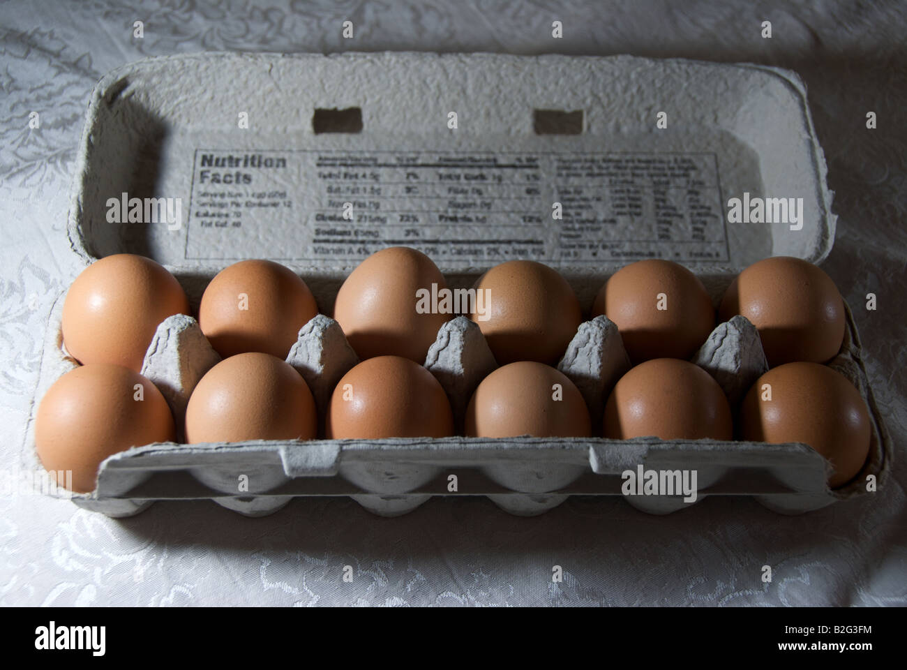 Dozen organic brown eggs Stock Photo Alamy