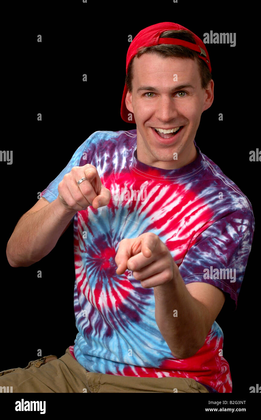Cool Guy pointing over dark background Stock Photo Alamy