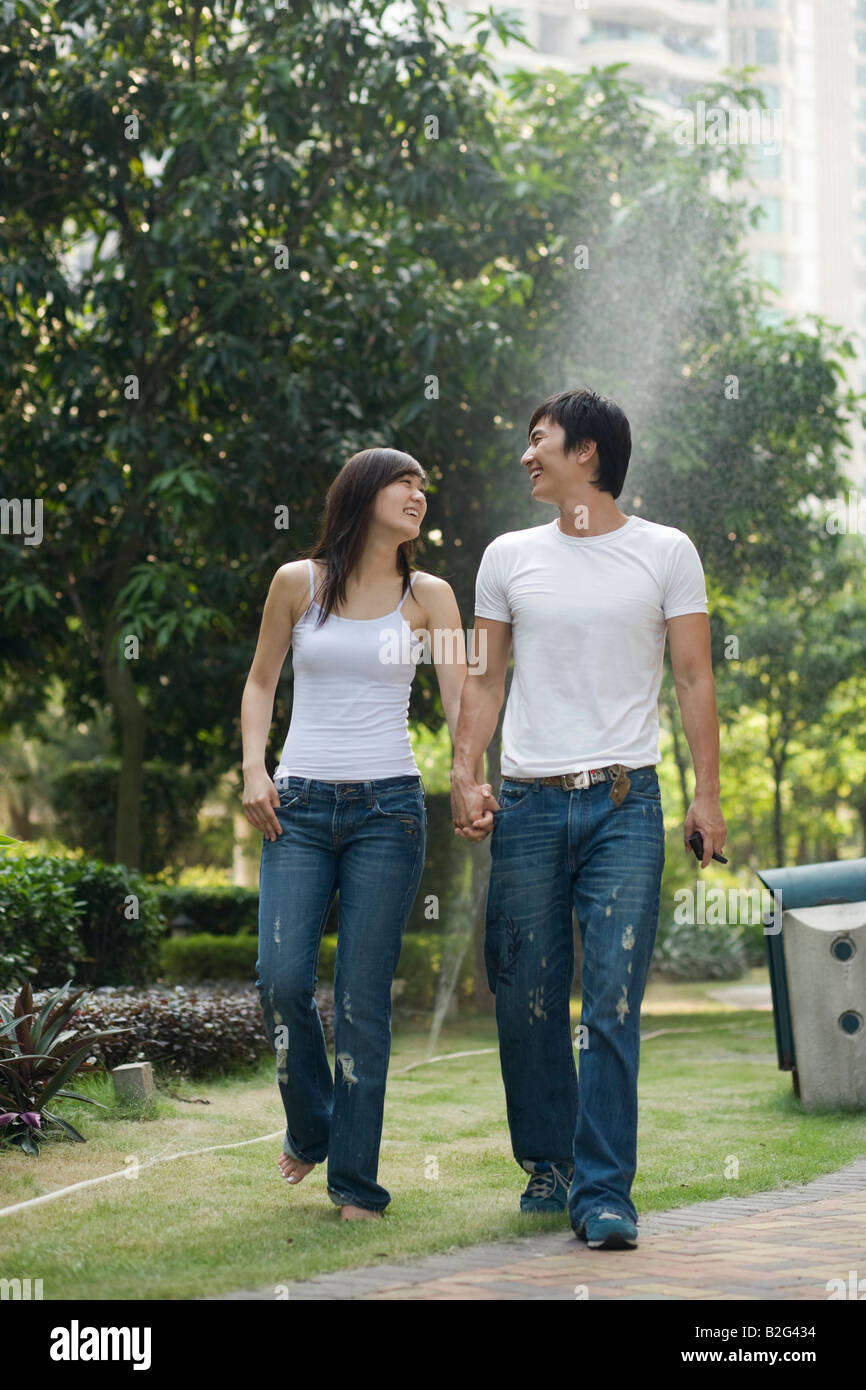 Walking barefoot grass asian hi-res stock photography and images - Alamy