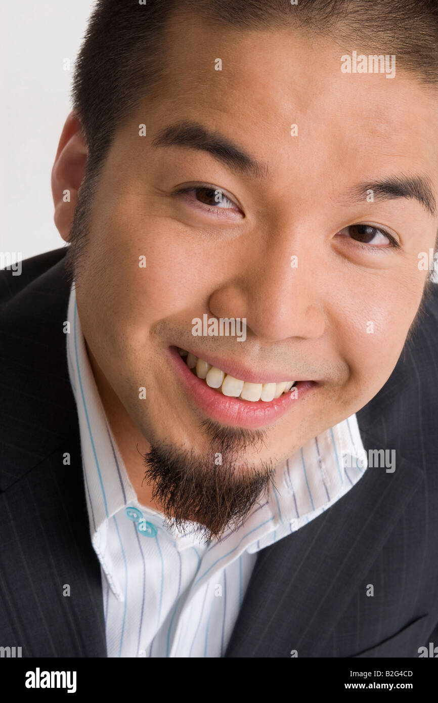 Portrait of a businessman smiling Stock Photo - Alamy