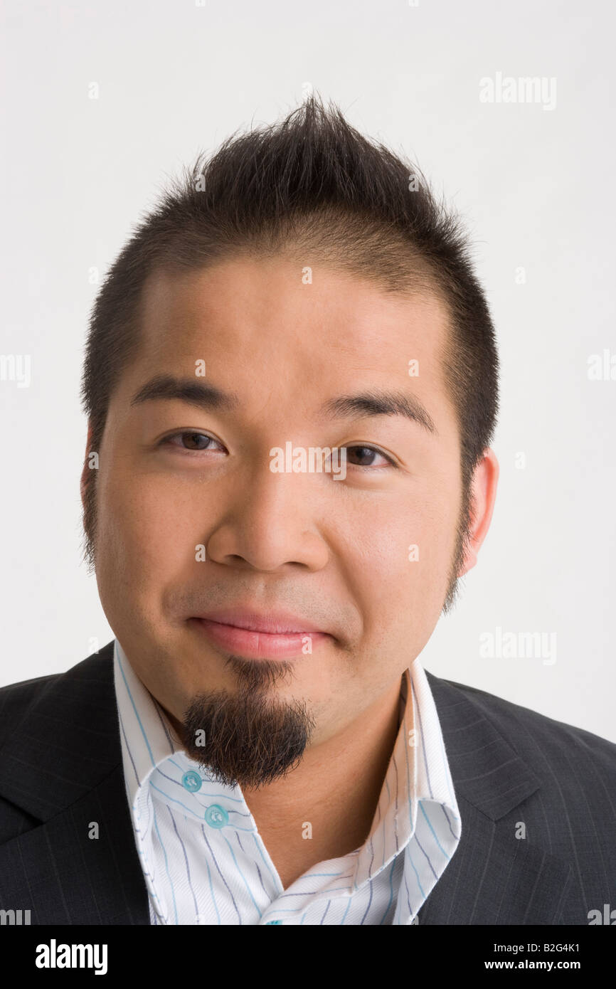 Portrait of a businessman smiling Stock Photo - Alamy