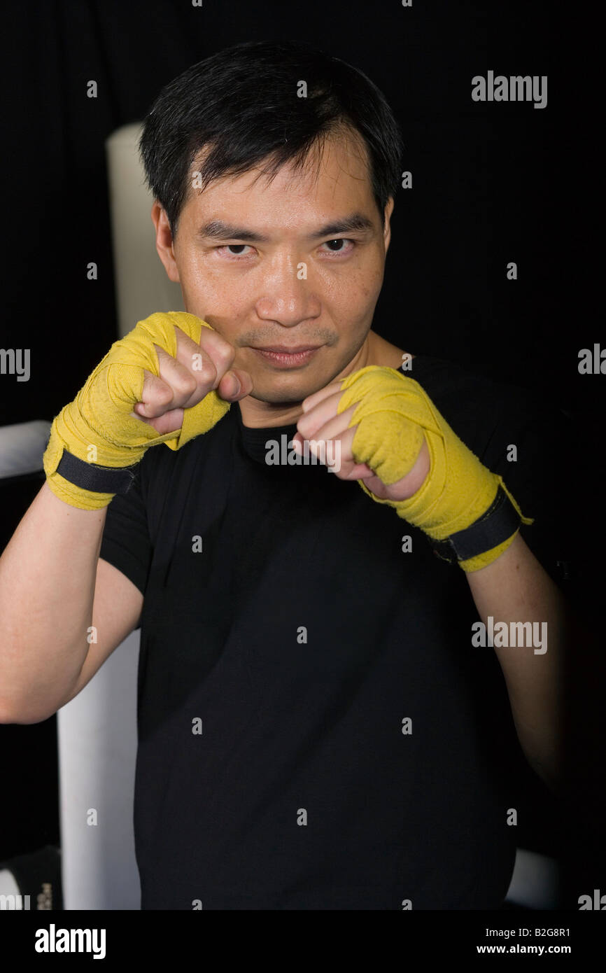 Mid adult man practicing boxing in a boxing ring Stock Photo Alamy