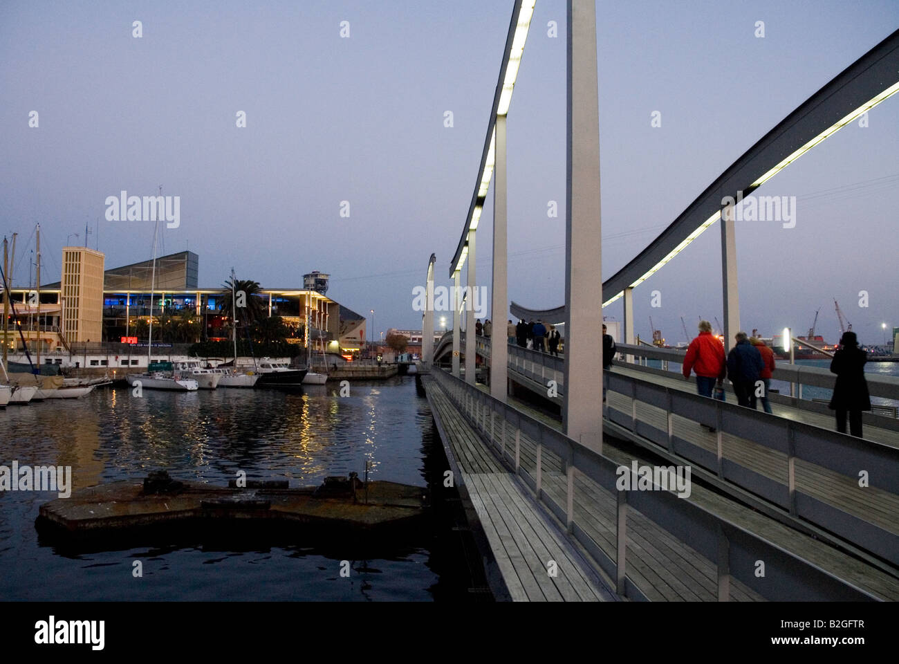 Rambla de Mar Port Vell bridge in the evening or night Barcelona Stock Photo