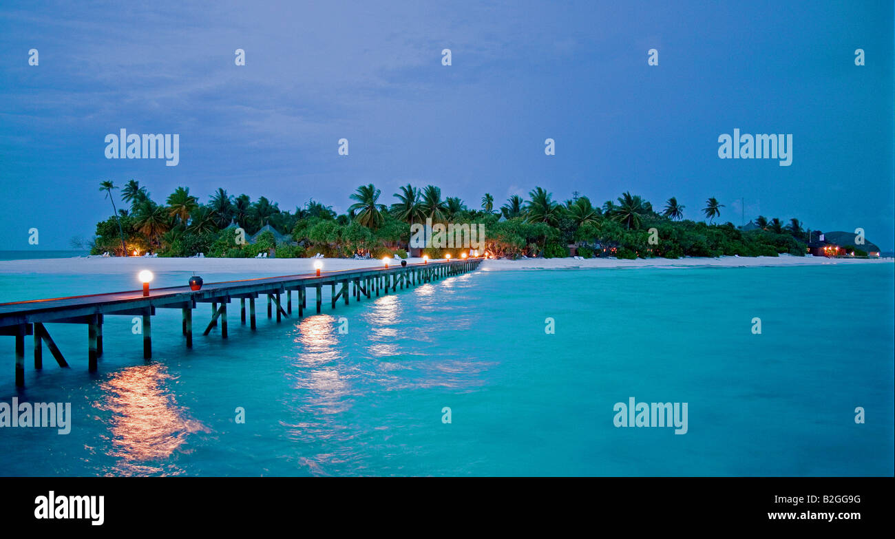 eveneing pier bridge ocean sea maledives holiday photos vacation photo Stock Photo