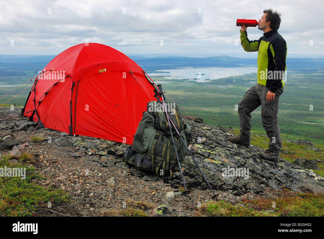 man outdoor camping viewpoint fjaell lake mount dundret gaellivare lapland sweden Stock Photo