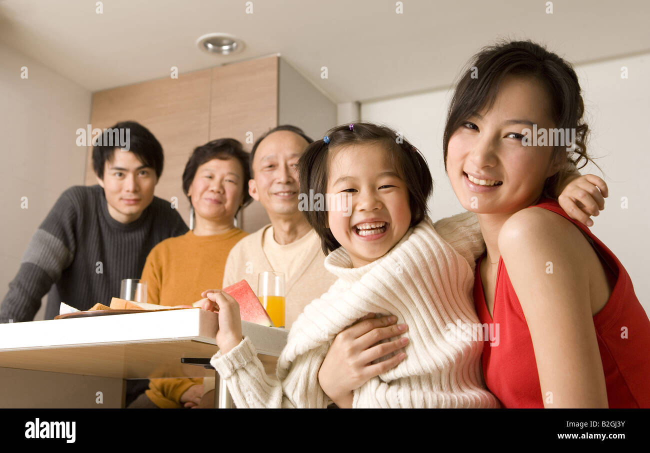 Portrait of a family at a breakfast table Stock Photo - Alamy