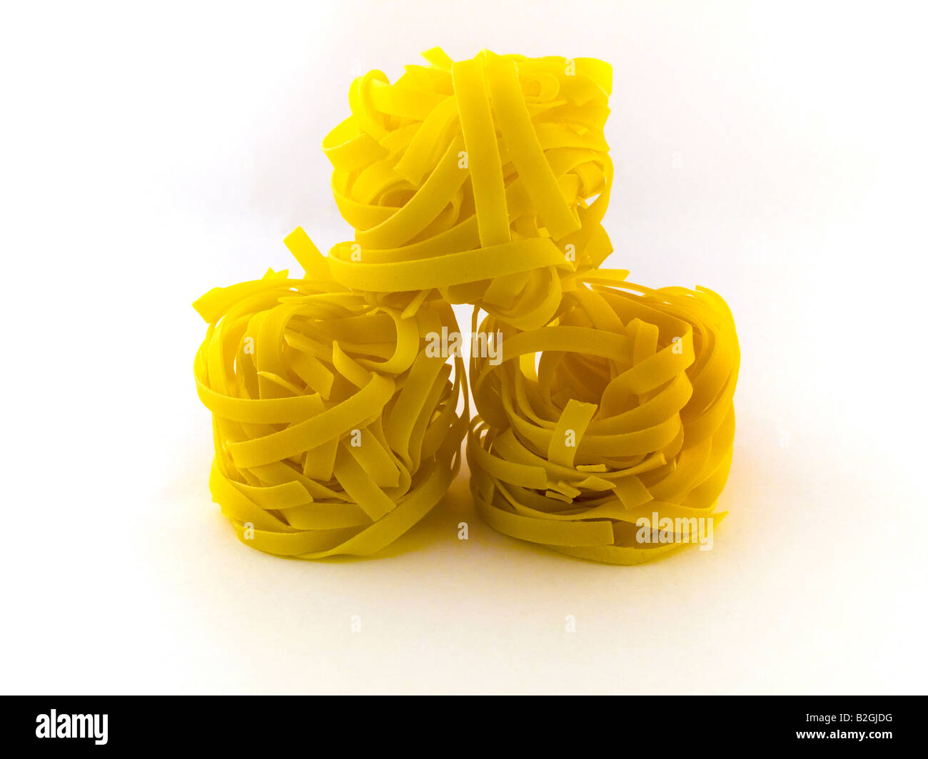 Pasta Tagliatelli on White Background Stock Photo