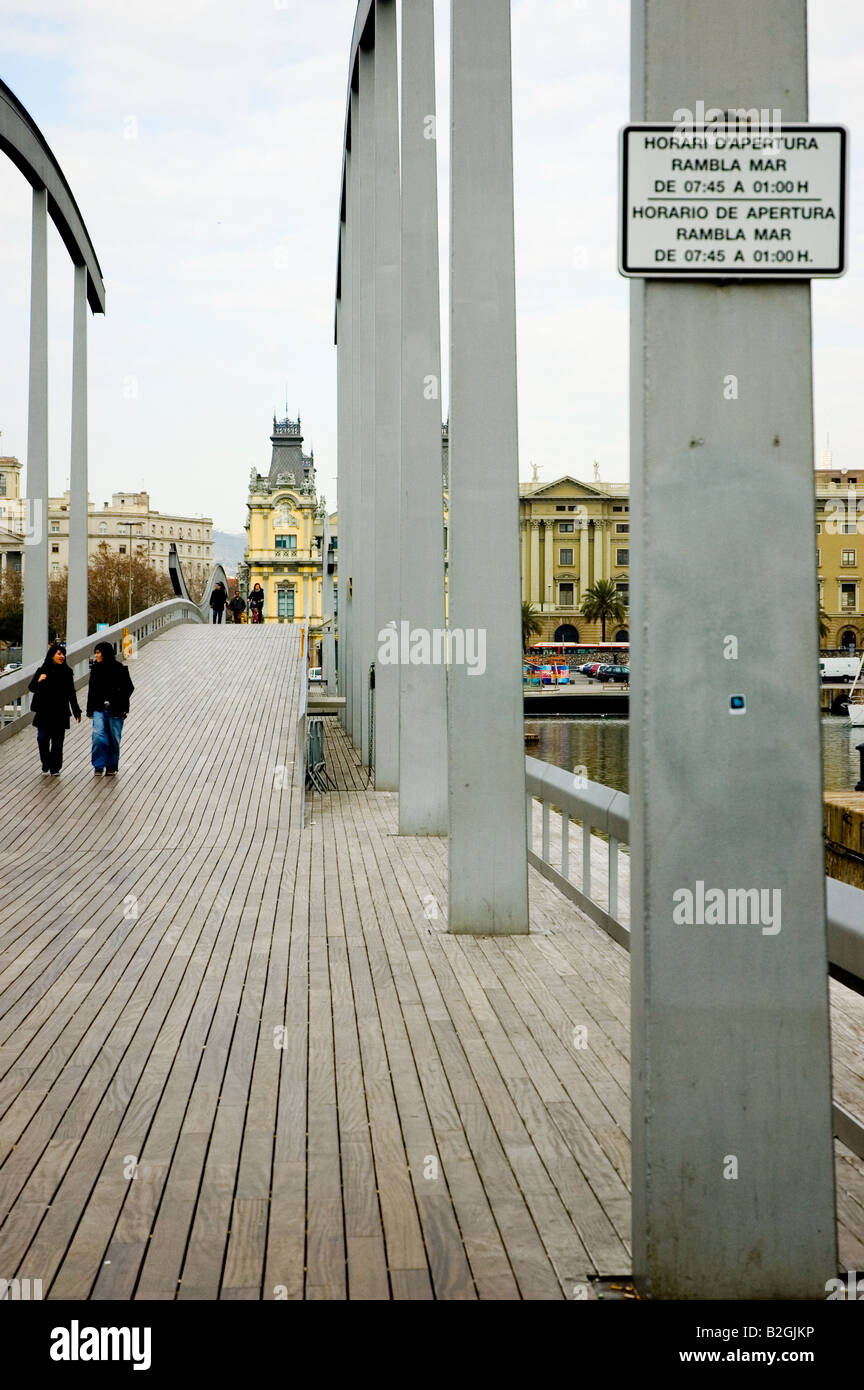 Rambla de Mar Port Vell bridge hours sign Barcelona Spain Stock Photo