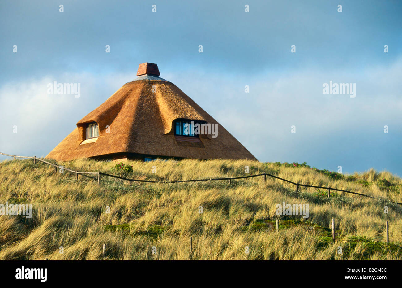 thatched roof cottage sylt dunes germany schleswig holstein north frisian island coast Stock Photo