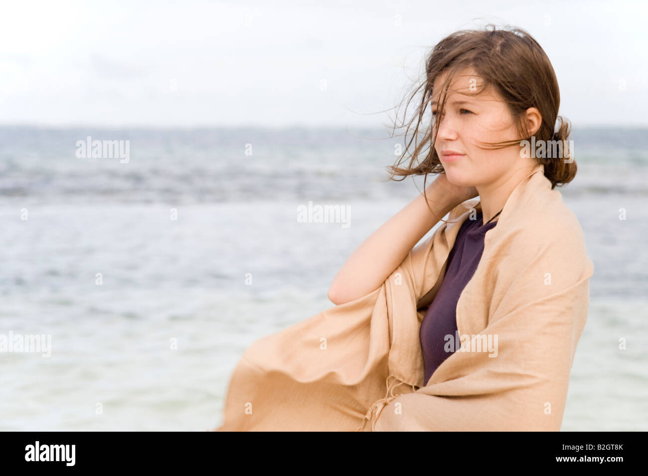 young woman beach sea watching Stock Photo - Alamy