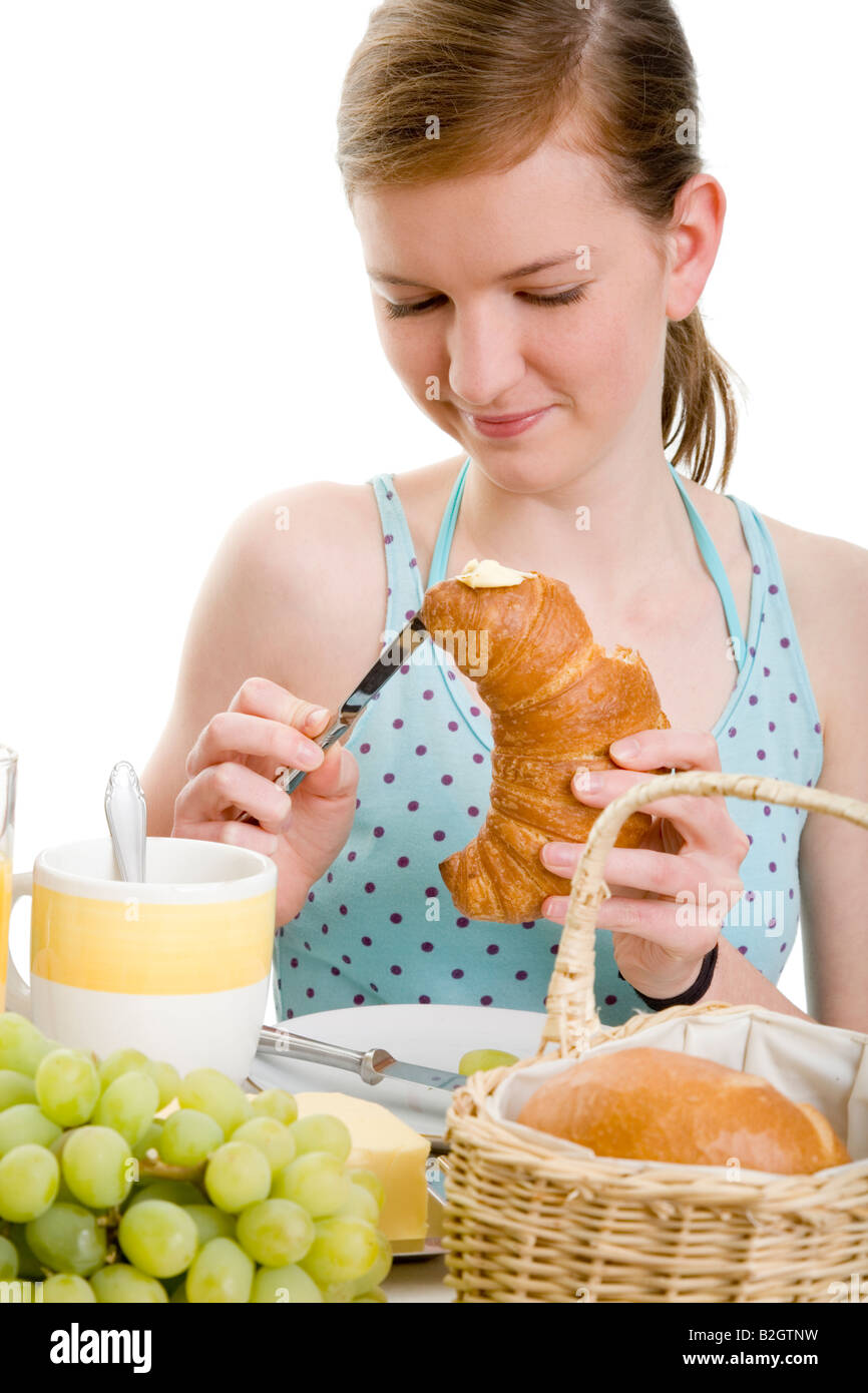 croissant young woman breakfast juice fruits healthful eating sound food morning fruits body care wellness people Stock Photo