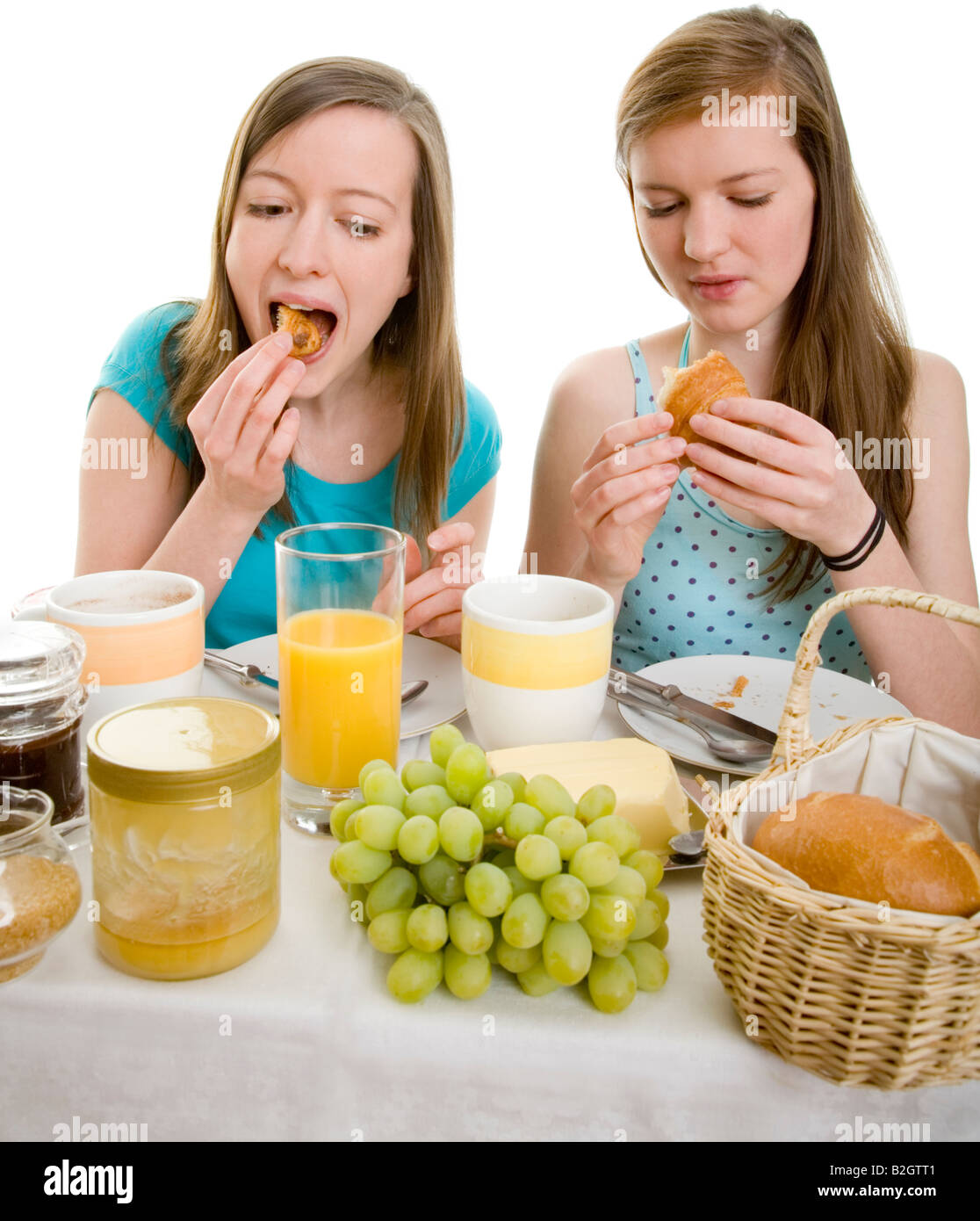 croissants female teenager women breakfast juice fruits healthful eating sound food morning body care wellness people Stock Photo