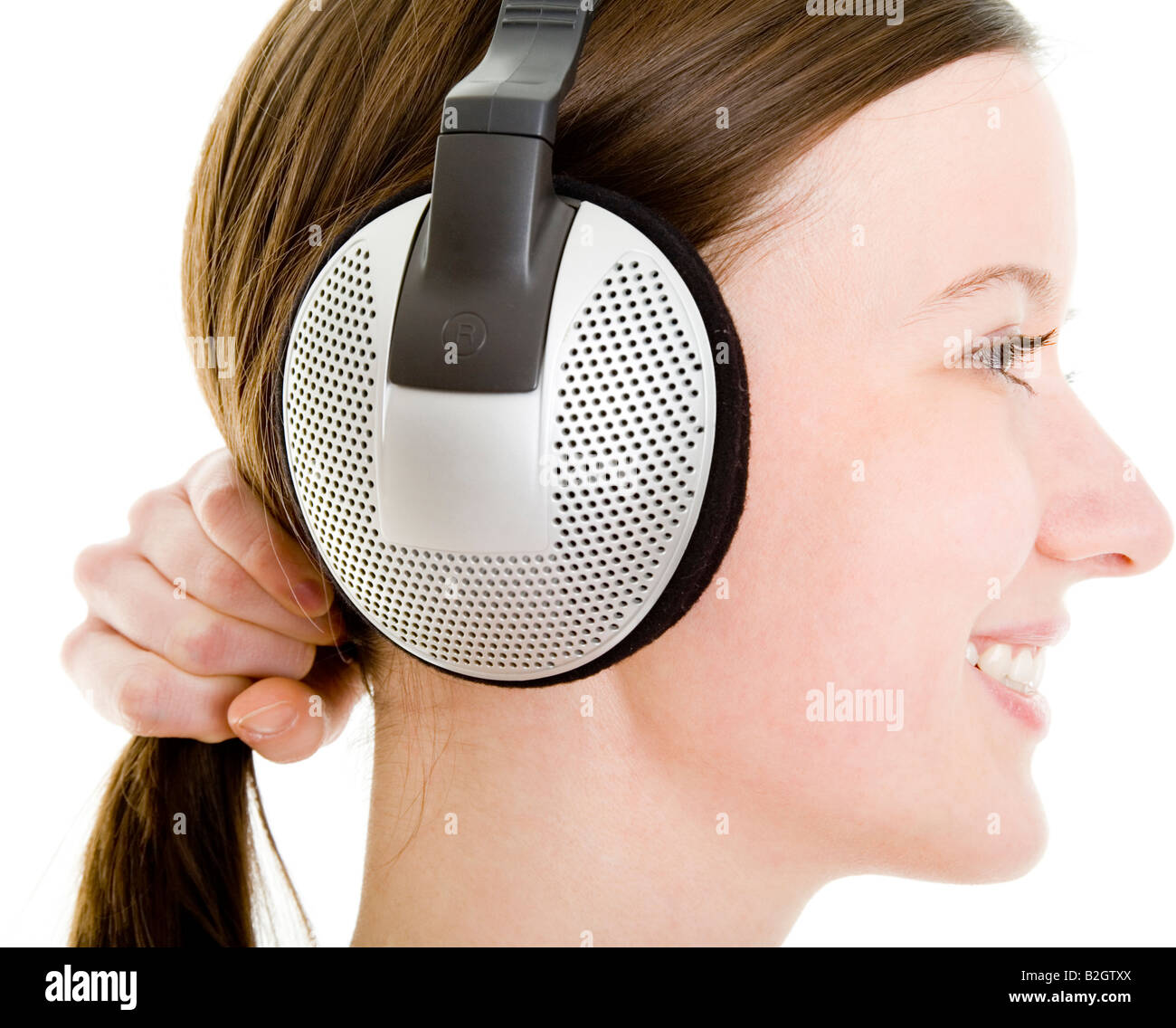 woman headphone music hearing hi fi audio pop music musical dj diskjockey entertainment Stock Photo