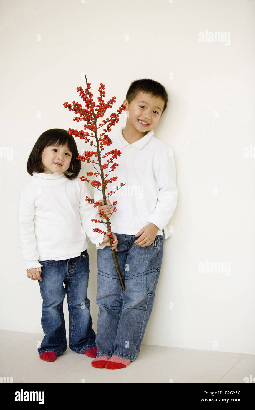 Asian boy girl standing hi-res stock photography and images - Alamy