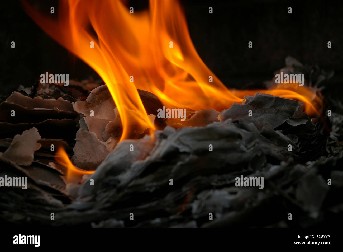 Flames from burning paper Stock Photo