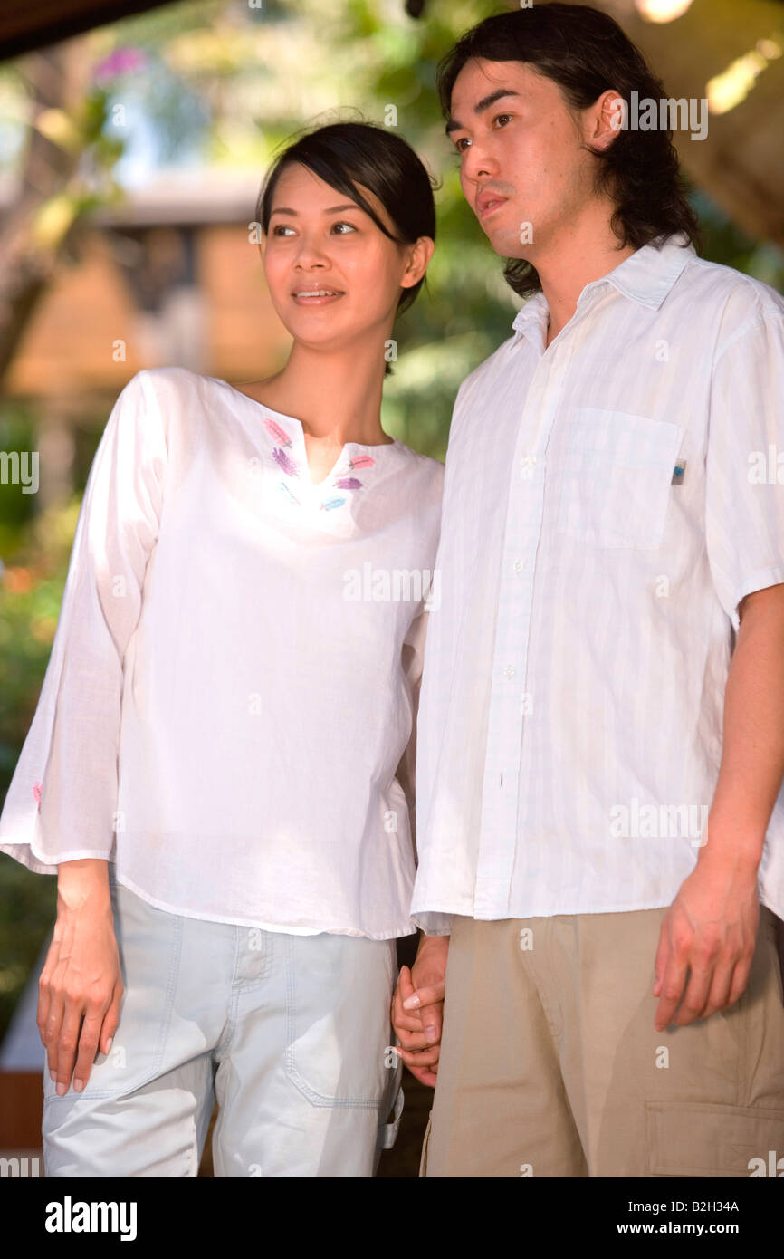 Young asian men holding hands hi-res stock photography and images - Alamy