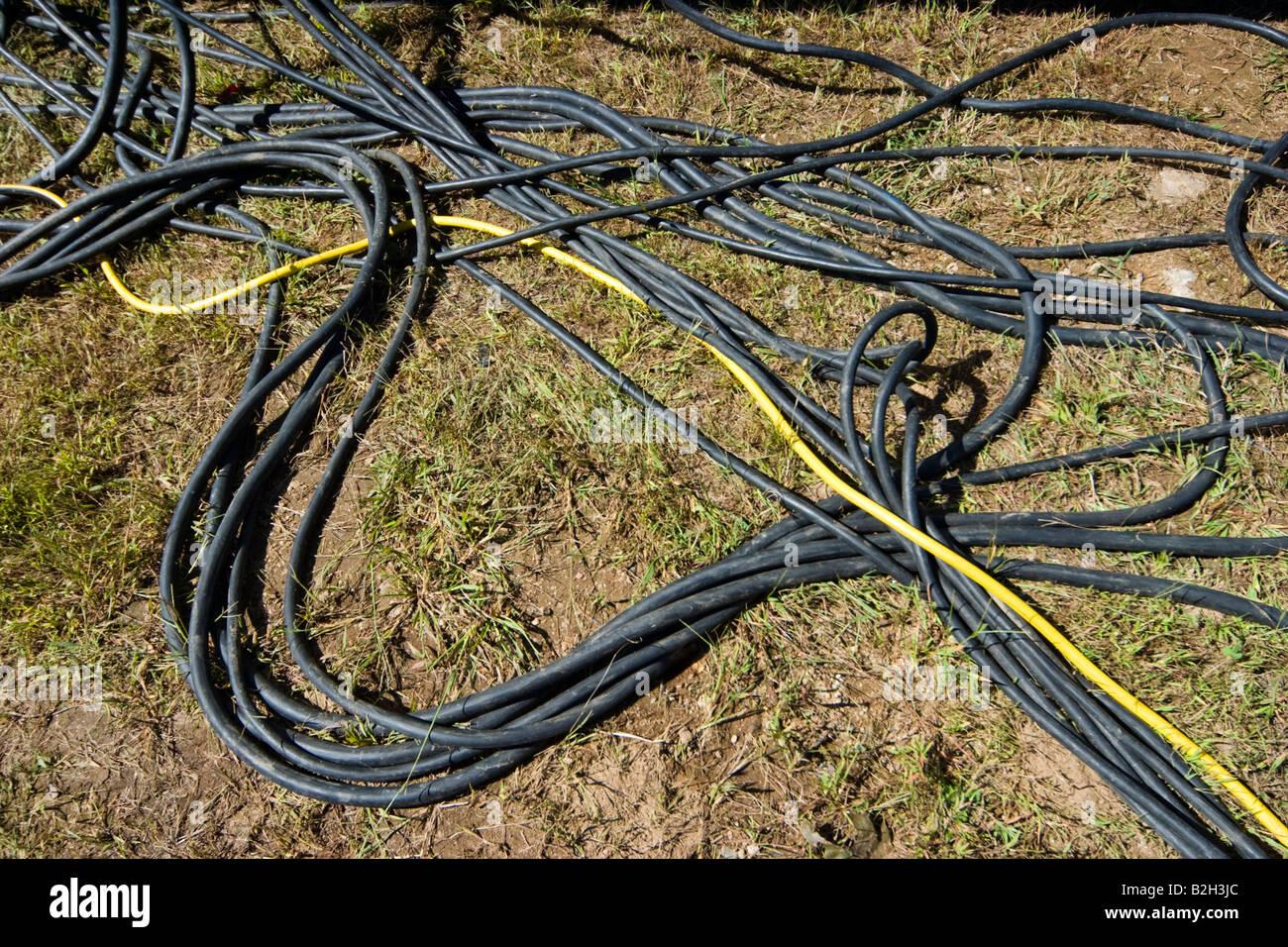 Electrical cables looking like a pile of spaghetti laying together on