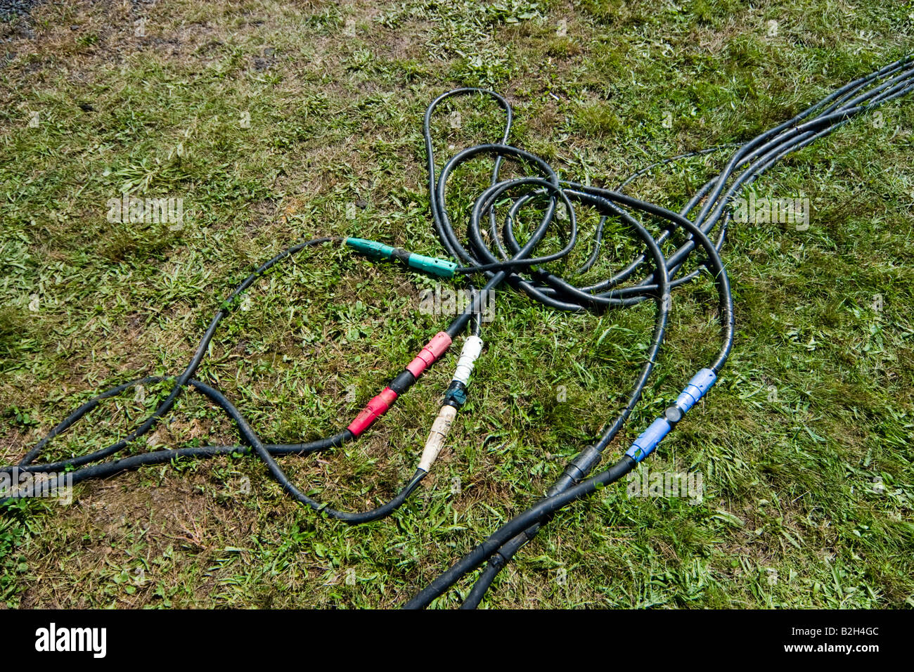 Electrical cables looking like a pile of spaghetti laying together on