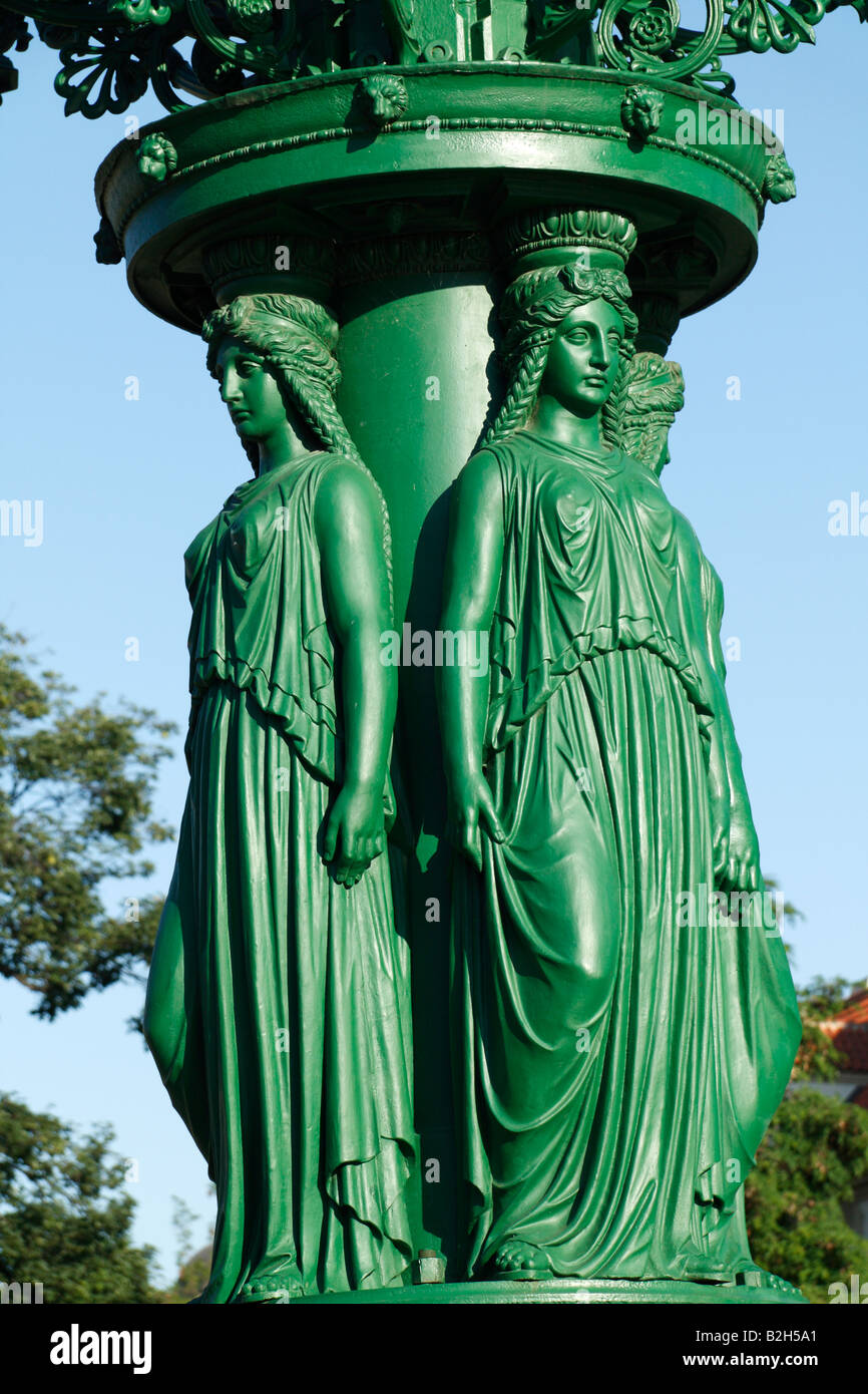 The close-up view of the statues of lamp post in the center of the Hradcany Square in Prague Stock Photo