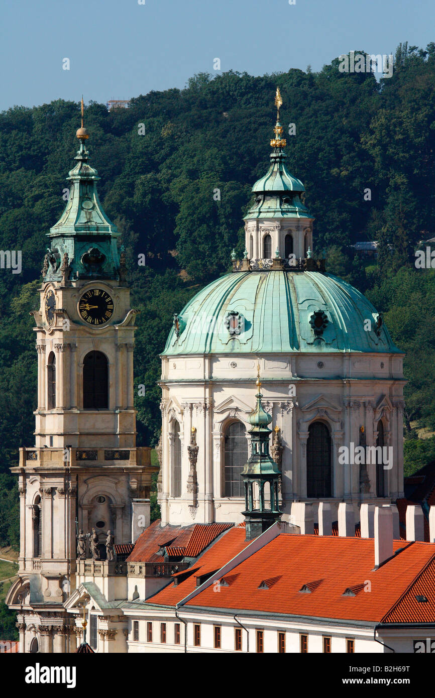 View of the dome and tower of St Nicolas Cathedral from the Prague Castle gate Stock Photo