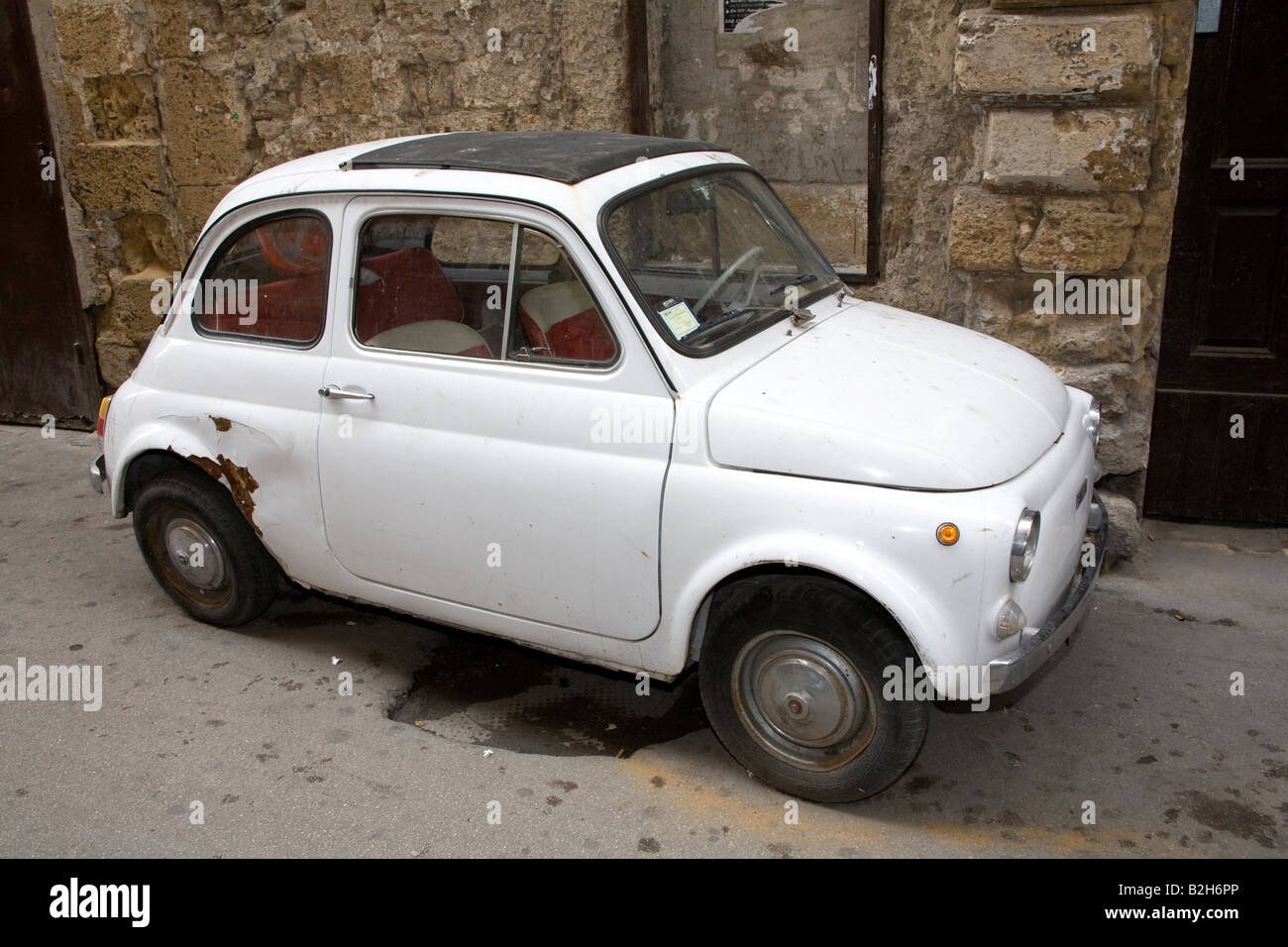 Old Fiat 500 in back street of Taranto Southern Italy June 2008 Stock ...